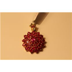 14KT YELLOW GOLD NATURAL RUBY PENDANT SET WITH  49 ROUND MIXED CUT NATURAL RUBIES APPROX. 7.40