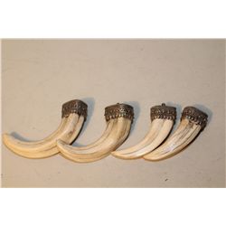 LOT OF 4 AFRICAN WARTHOG TUSK PENDANTS WITH SILVER FILIGREE