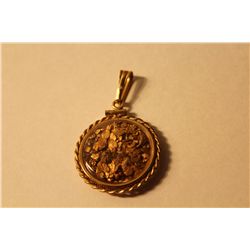 YELLOW GOLD PLATED AND 22KT YELLOW NATURAL PLACER GOLD NUGGET PENDANT CONSISTING IF A COLLECTION OF