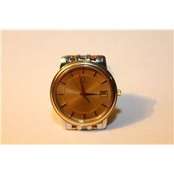 ONE GENTS OMEGA STAINLESS STEEL & YELLOW GOLD WRIST WATCH. HAS A CHAMPAGNE DIAL AND YELLOW GOLD