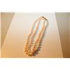 Image 1 : ONE STRAND OF ROUND WHITE JAPANSESE AKOYA CULTURED PEARLS KNOTTED TO A LENGTH OF APPROX. 61 CM WITH