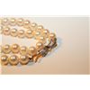Image 2 : ONE STRAND OF ROUND WHITE JAPANSESE AKOYA CULTURED PEARLS KNOTTED TO A LENGTH OF APPROX. 61 CM WITH