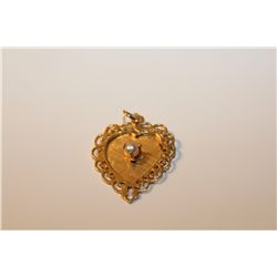 ONE 14 KT YELLOW GOLD WHITE CULTURED PEARL HEART SHAPED PENDANT.  CLAW SET WITH 1 ROUND WHITE