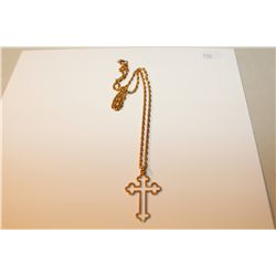 ONE 18KT YELLOW GOLD ITALIAN MADE IN A CROSS DESIGN PENDANT.  REPLACEMENT VALUE: $225.00