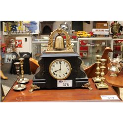 UNUSUAL GILBERT MANTLE CLOCK AND 4 BRASS CANDLE STICKS