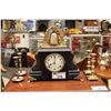 Image 1 : UNUSUAL GILBERT MANTLE CLOCK AND 4 BRASS CANDLE STICKS