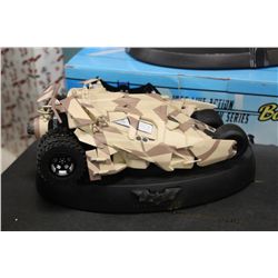 DC DIRECT, BATMAN BEGINS CAMO BATMOBILE REPLICA, BROKEN FRONT WHEEL AND SPOILER