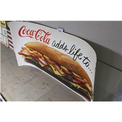 COCA-COLA ADDS LIFE TO... SIGN