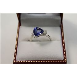 LADIES 14KT. WHITE GOLD NATURAL TANZANITE AND DIAMOND SET DRESS RING SET WITH A TOTAL OF 1