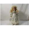 Image 1 : 18" PORCELAIN DOLL IN WHITE & GREEN DRESS