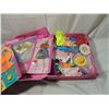 Image 2 : VINTAGE BARBIE DOLL CASE FULL OF CLOTHES