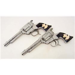 PAIR OF VINTAGE 1950S HOPALONG CASSIDY DIECAST CAP GUNS