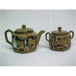 Buffalo Pottery Deldare Ware teapot and covered sugar, teapot with lid "Village life in ye olden...