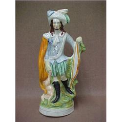 Staffordshire figurine of man with bow and deer kill, measures 14  high, mid 19th C. Estimate...