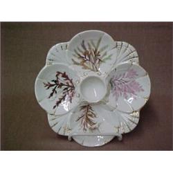 Porcelain oyster plate with hand painted underwater plant life and gilt line decoration, measures...