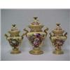 Image 1 : A set of three covered Copeland & Garrett urns, porcelain with gilt and painted decoration, fruit...