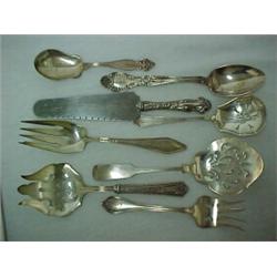 One lot of eight sterling silver flatware serving pieces incl. Gorham sliced tomato server "Old E...
