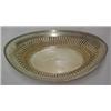 Image 1 : Sterling silver bread basket, reticulated banding around rim over fluted decoration, flat bottom...