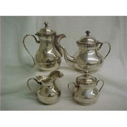 Four piece 800 silver tea and coffee service including teapot, coffee pot, creamer, and sugar wit...