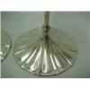 Image 3 : A pair of sterling silver weighted candlesticks, fluted candleholders over leaf shaped decoration...