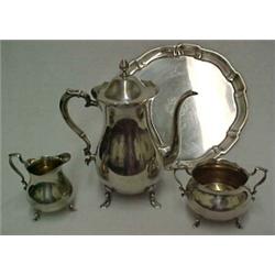 Four piece sterling silver coffee service "Chippendale" incl. coffee pot with hinged lid, creamer...