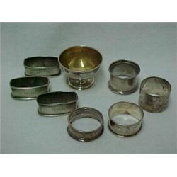 One lot of sterling silver including three rectangular shaped napkin rings initialed RRB, NHB, an...