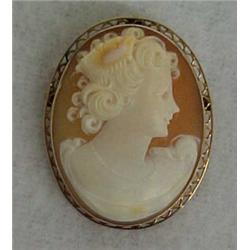 10K gold cameo brooch, carved shell cameo with gold bezel and filigree frame, 1 1/8" x 1 3/8", ma...