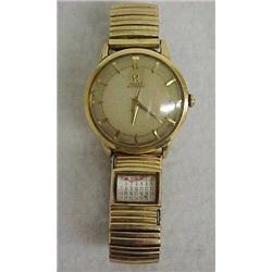 Man's Omega automatic wrist watch, gold filled case and stretch band, 17 jewel movement, calendar...
