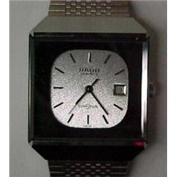 Man's Rado wrist watch, Diastar Quartz Calendar watch, stock #Q67/1 rhodium with gray dial, in or...