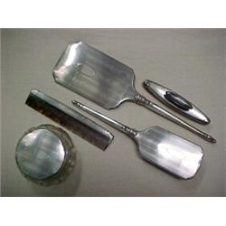 Five piece sterling silver dresser set, sterling silver dresser set comprised of hand mirror, bru...
