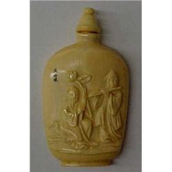 Ivory snuff bottle, 2 5/8" high bottle with two figures in relief, reverse has engraving of old m...