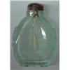 Image 1 : Aquamarine snuff bottle with carved sides, decorated with masks and rings, 2 1/2" high includes p...