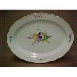 Meissen porcelain platter, polychrome floral decoration, with center iris, gilt rim, crossed swor...