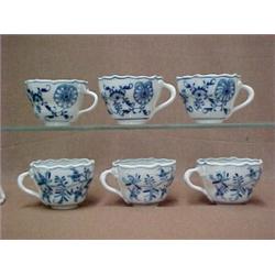 A set of six Meissen "Blue Onion" teacups, five with Meissen in oval and Germany mark, one with a...