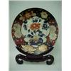 Image 1 : Chinese Imari charger on stand, center decoration with chrysanthemum in planter surrounded by sty...