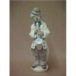 Lladro figurine LNo5471 "Sad Sax", 8 1/2", open issue, active, issue year 1988 Estimate 150/30...