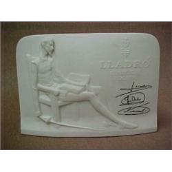 Lladro bisque Collector's Society Plaque, signed by three artists, relief depicting seated Don Qu...