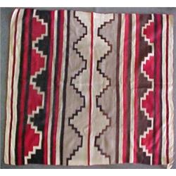 Navajo rug, striped and geometric design in red, dark brown, black, grey, and white, early 20th C...