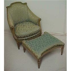 Regency style upholstered armchair, curved crest with stylized decoration over sloping arms endin...