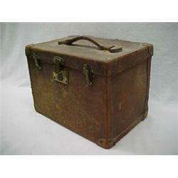 Top hat and spats in leather case, man's top hat, with cloth label "Dobbs, 244 and 620 Fifth Ave,...