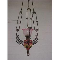 Art Nouveau hanging oil lamp, replaced pink glass shade with stylized design, three metal floral...