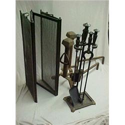 A six piece Bradley & Hubbard fireplace set including tongs, poker, brush, and shovel in holder,...