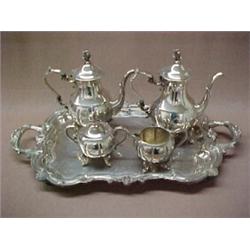 Four piece silverplated tea and coffee service on silverplated handled tray, coffee pot and teapo...