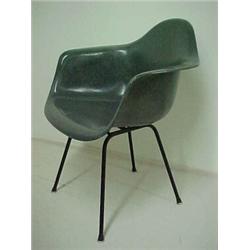 Eames D.A.R. chair, original Herman Miller label, charcoal grey molded fiberglass shell resting o...