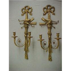 A pair of Federal style gilt wood double candle sconses, each with carved ribbon crest over eagle...