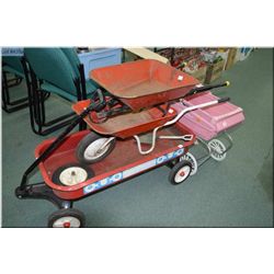Selection of child's toys including pull way, two wheel barrows and a pram