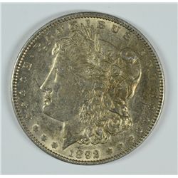 1892 MORGAN SILVER DOLLAR, AU-58