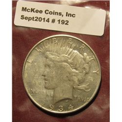 192. 1934 D U.S. Peace Silver Dollar. Mint Error. Struck on a planchet that had either a severely wo