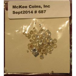 687. 4.50 Carats of small Diamonds of various grades which have been removed from Rings and various 