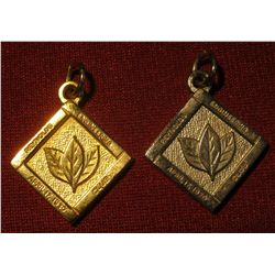 809. (2) Pendants / charms from Reynolds (Tobacco Co.) Engineering Club, April 17, 1930, one gold co